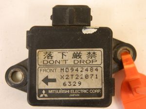 Датчик ускорения MITSUBISHI DIAMANTE F31A (Б/У) 65243615